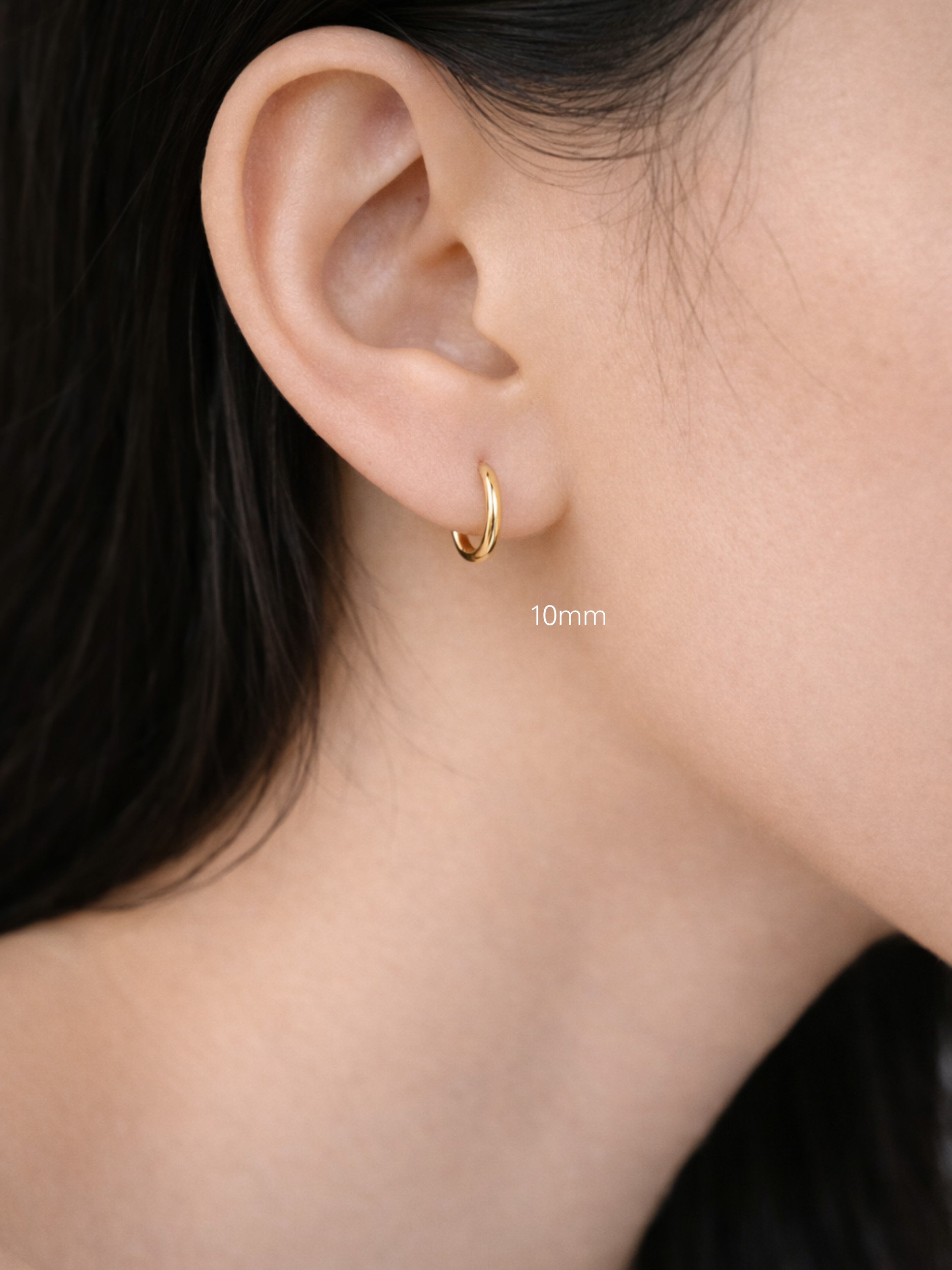 10mm lightweight titanium hoop earrings on model