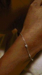 Alexis bracelet on wrist with casual outfit