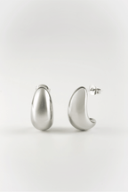 close up sculptural bean earrings high polish finish