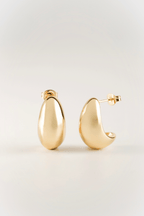 astrid organic sculpt bean earrings front view in gold color