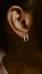 Silver hoop earrings styled on model – MNML BIANCA