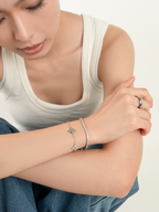 Cassiopeia Celestial Spin Ring worn on hand