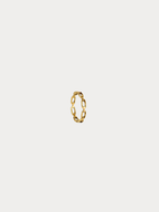 Cleo Chain Link Ring in gold titanium with open link-chain design, studio hero sho