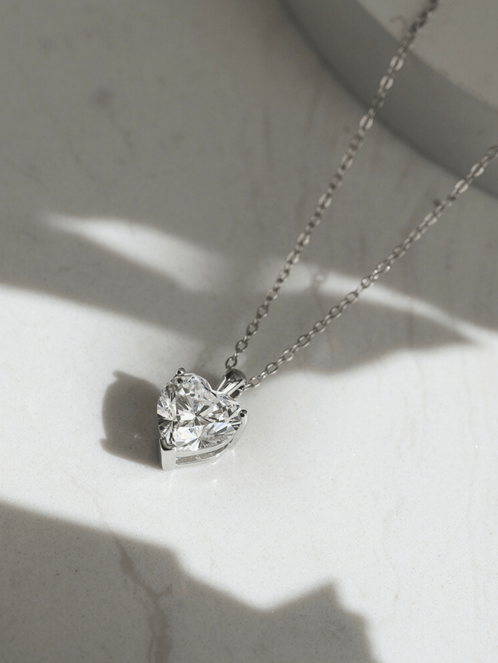 Close-up of heart-cut 8A CZ on MNML Amoura Eternal Brilliance Necklace — diamond-like brilliance