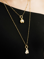 Long layering charm necklace gold
