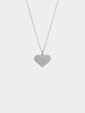 Diamond Heart Engravable Necklace silver tone titanium product flatlay, flat heart pendant on fine cable chain