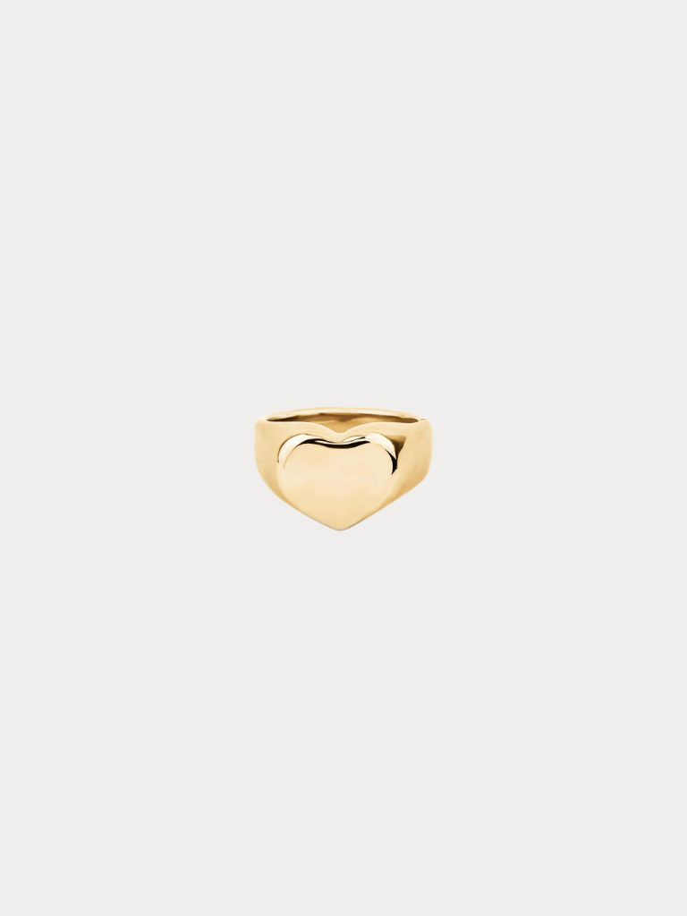 Eros Engravable Signet Ring gold tone titanium, heart-shaped signet face on tapered band, product flatlay