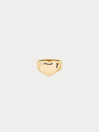Eros Engravable Signet Ring gold tone titanium, heart-shaped signet face on tapered band, product flatlay