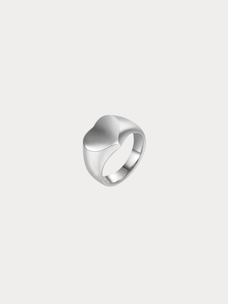 Eros Engravable Signet Ring silver tone titanium, heart-shaped signet face on tapered band, product flatlay