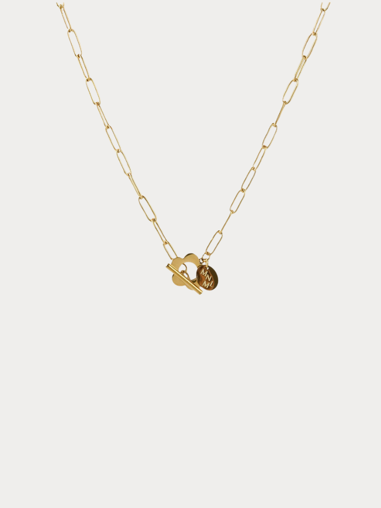 Flower Toggle Necklace gold tone stainless steel, bold paperclip chain with front toggle clasp and flower charm, product flatlay