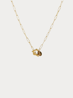Flower Toggle Necklace gold tone stainless steel, bold paperclip chain with front toggle clasp and flower charm, product flatlay