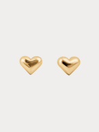 Heart Stud Earrings gold tone stainless steel, puffy 3D heart studs, product flatlay