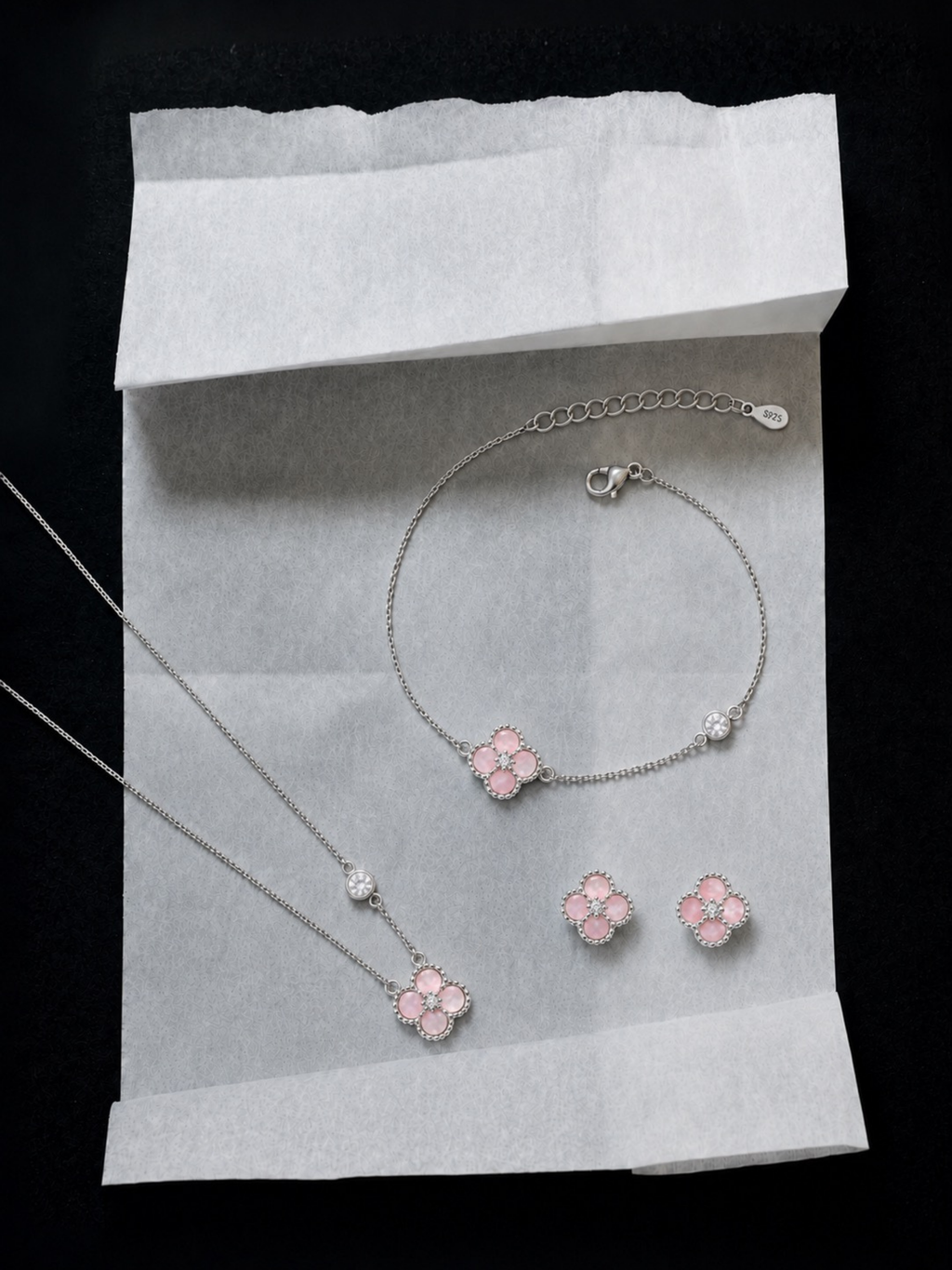 Detail of adjustable extension chain on Jolie bracelet and necklace , ear studs