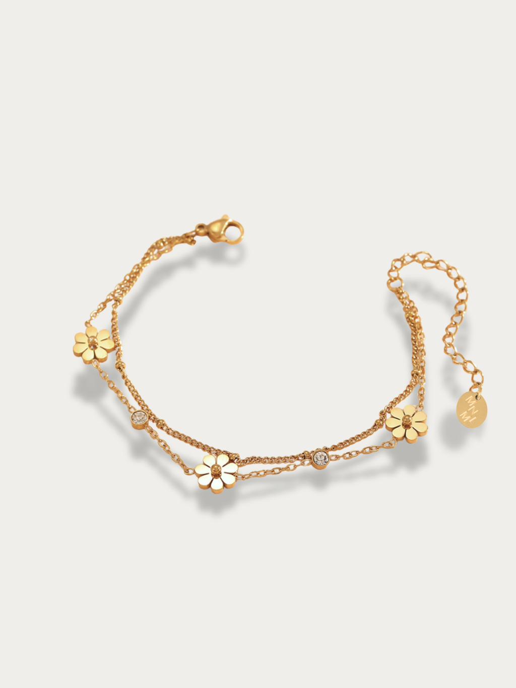 Minimal daisy bracelet with cubic zirconia on a light gray background
