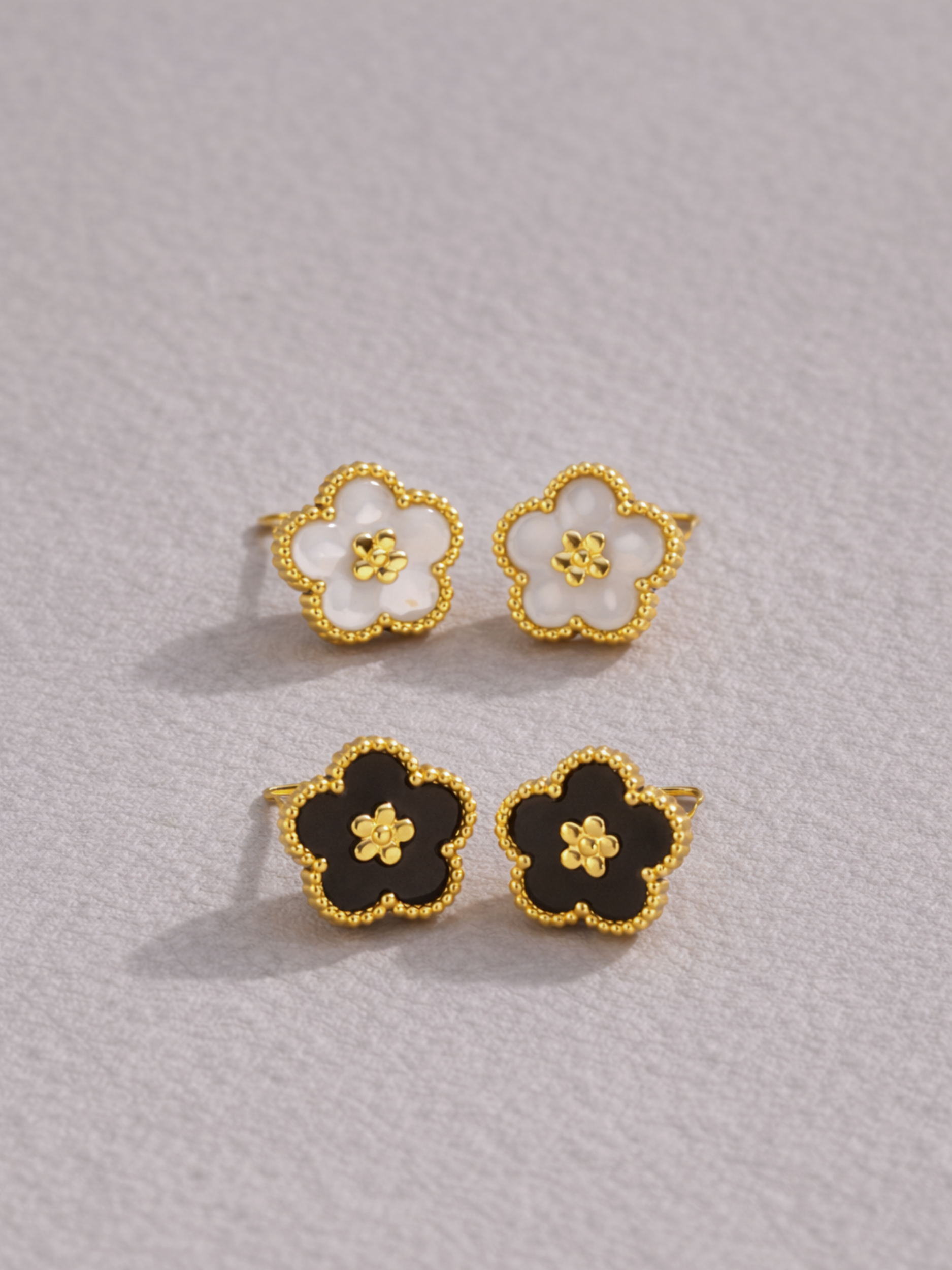 Titanium flower stud earrings mother of pearl