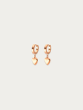 Minimalist heart jewelry in rose gold titanium for sensitive ears.