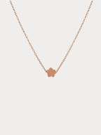 Mini Flower Engravable Necklace in rose gold titanium with flat flower pendant, studio hero sho