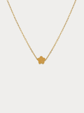 Mini Flower Engravable Necklace in gold titanium with flat flower pendant, studio hero sho