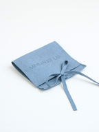 Blue fabric pouch with 'MINIMALIST LAB' branding on a white background