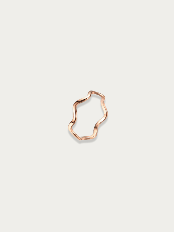 Ondine Wave Ring in polished rose gold stainless steel on a neutral background.