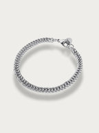 Aegis Curb Chain Bracelet silver tone stainless steel, franco-style woven curb chain, product flatlay