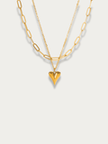 Amora Double Layered Necklace in gold titanium with paperclip chain, fine chain, and heart pendant, studio hero shot