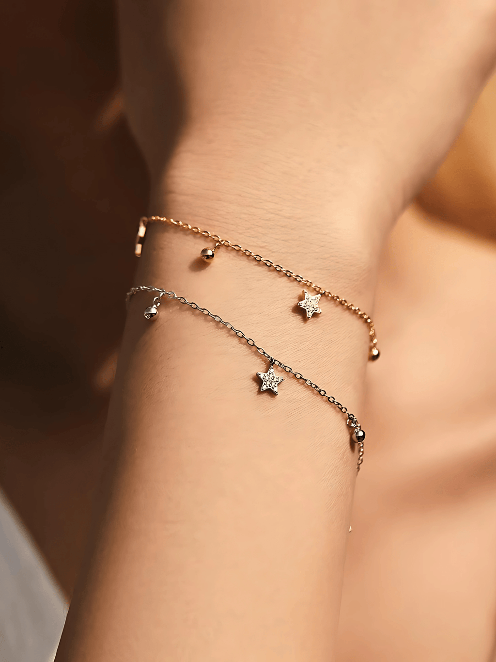 Model wearing APOLLO Star Charms Bracelet on wrist