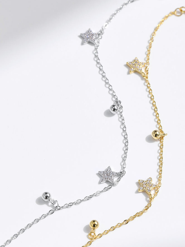 Side profile view of APOLLO Star Charms Bracelet
