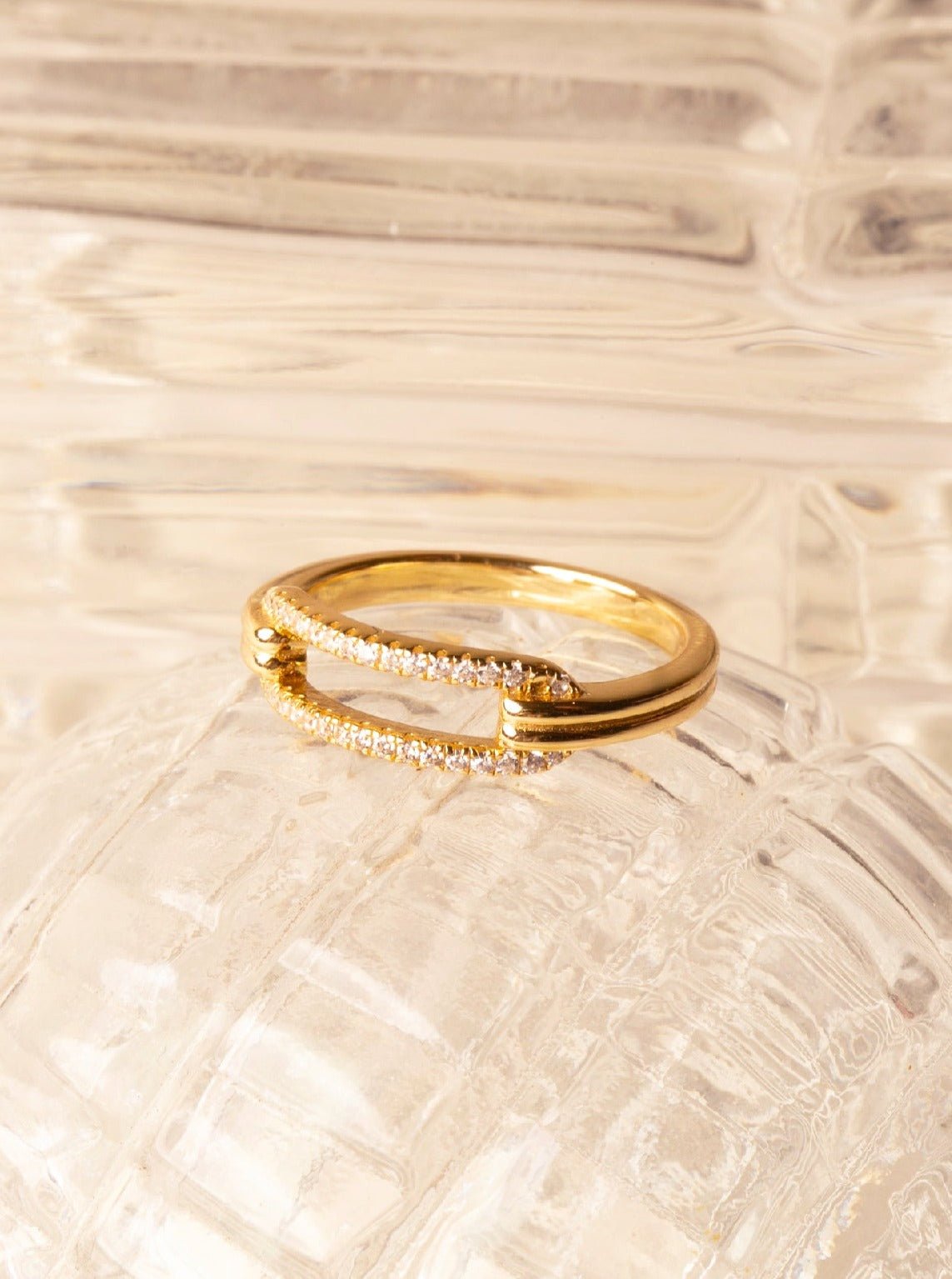 ARIA Chain Link Ring in silver, styled lifestyle shot in gold colour
