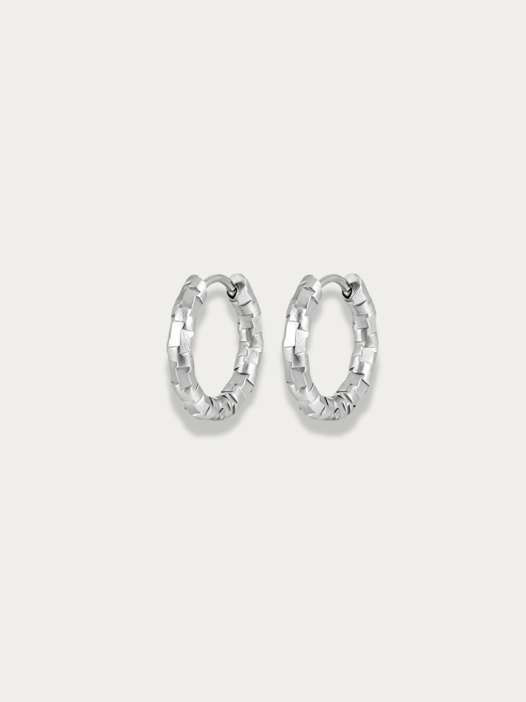 Atlas Textured Hoop Earrings in silver, 15mm size, studio hero shot