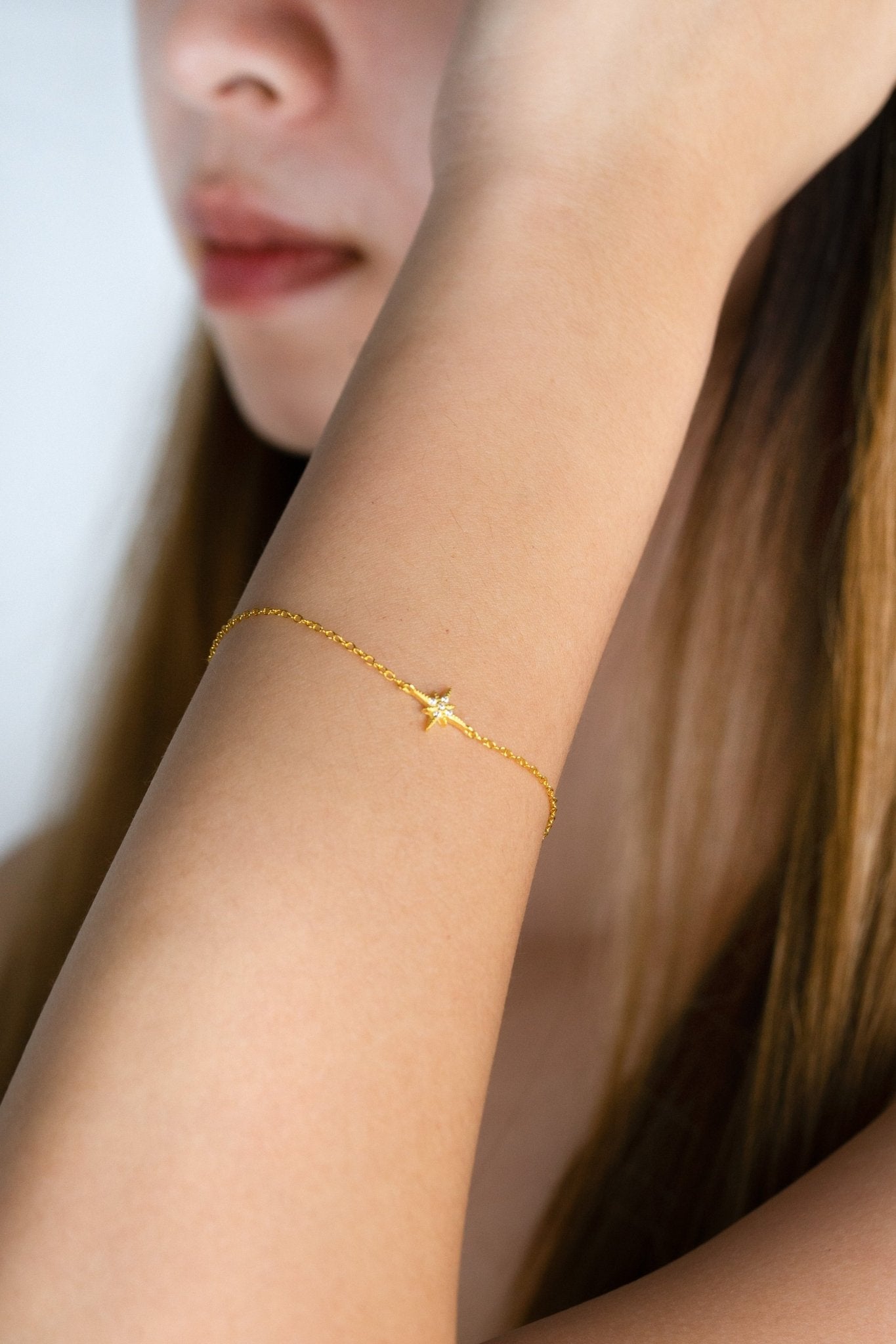 Model wearing ATRIA North Star Bracelet on wrist