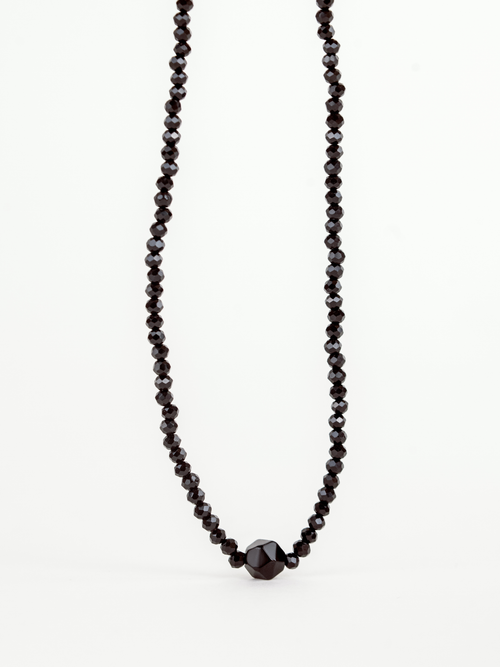 Close-up of faceted black crystal beads on Balance Necklace