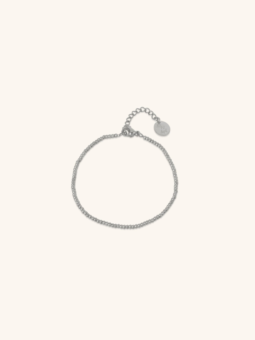 Beaded Bracelet silver tone titanium, continuous ball bead bracelet with MNML disc charm, product flatlay