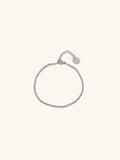 Beaded Bracelet silver tone titanium, continuous ball bead bracelet with MNML disc charm, product flatlay