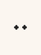 Black Clover Stud Earrings silver tone titanium, four-petal clover with black enamel and milgrain border, product flatlay