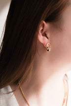 bold minimalist Roman numeral earrings styling