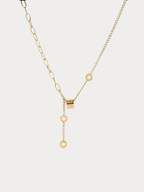 Bold Mixed Chain Lariat Necklace gold tone titanium, asymmetric paperclip and curb chain with barrel pendant, product flatlay
