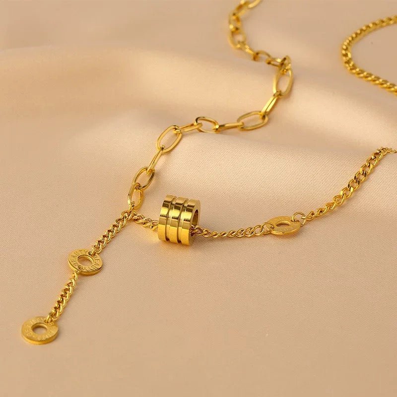 Mixed chain junction detail showing paperclip and curb chain meeting on Bold Lariat Necklace