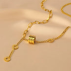 Mixed chain junction detail showing paperclip and curb chain meeting on Bold Lariat Necklace
