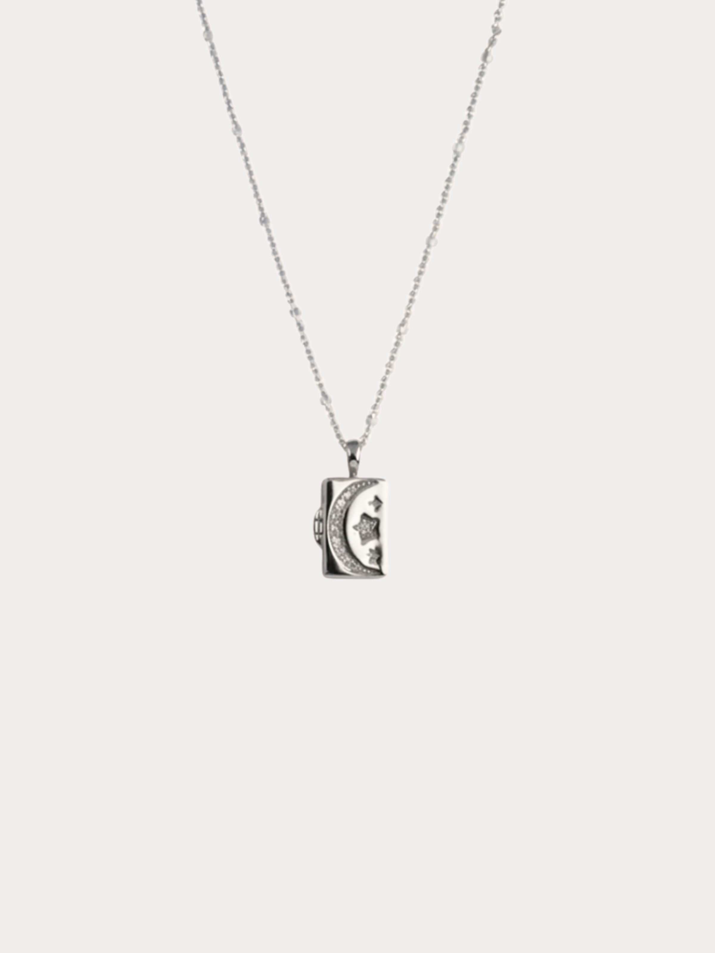 CALLISTA Galactic Locket Necklace front design, crescent moon and stars