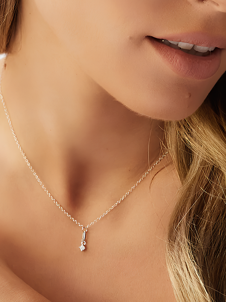 Model wearing CAMILLE Diamond Drop Necklace at the collarbone