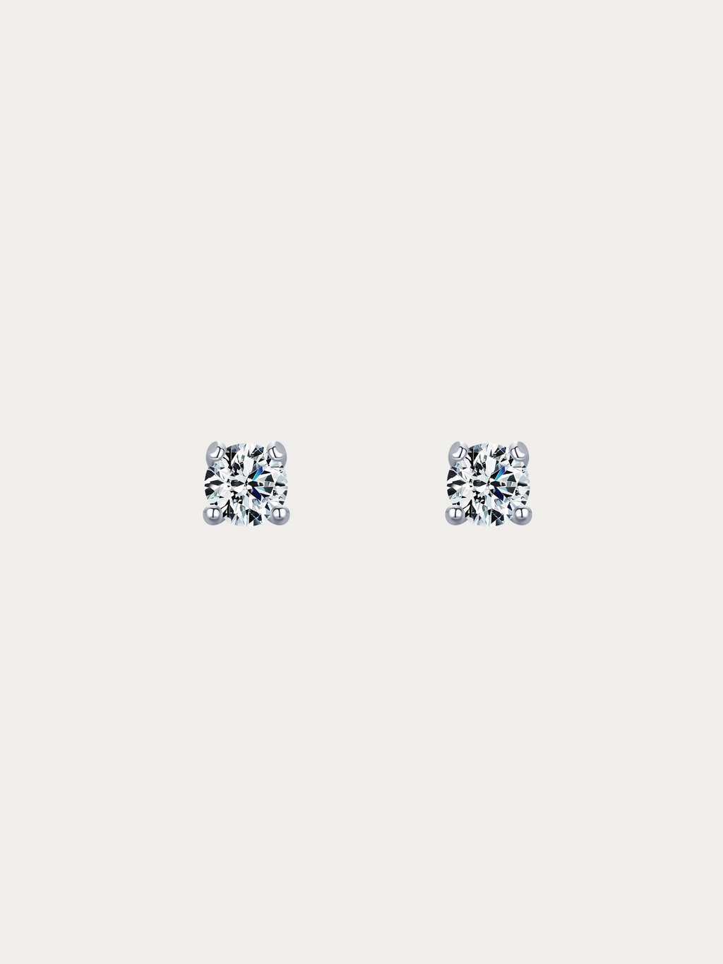 Caulie Classic Everyday 0.1ct Moissanite Stud Earrings pair on light background