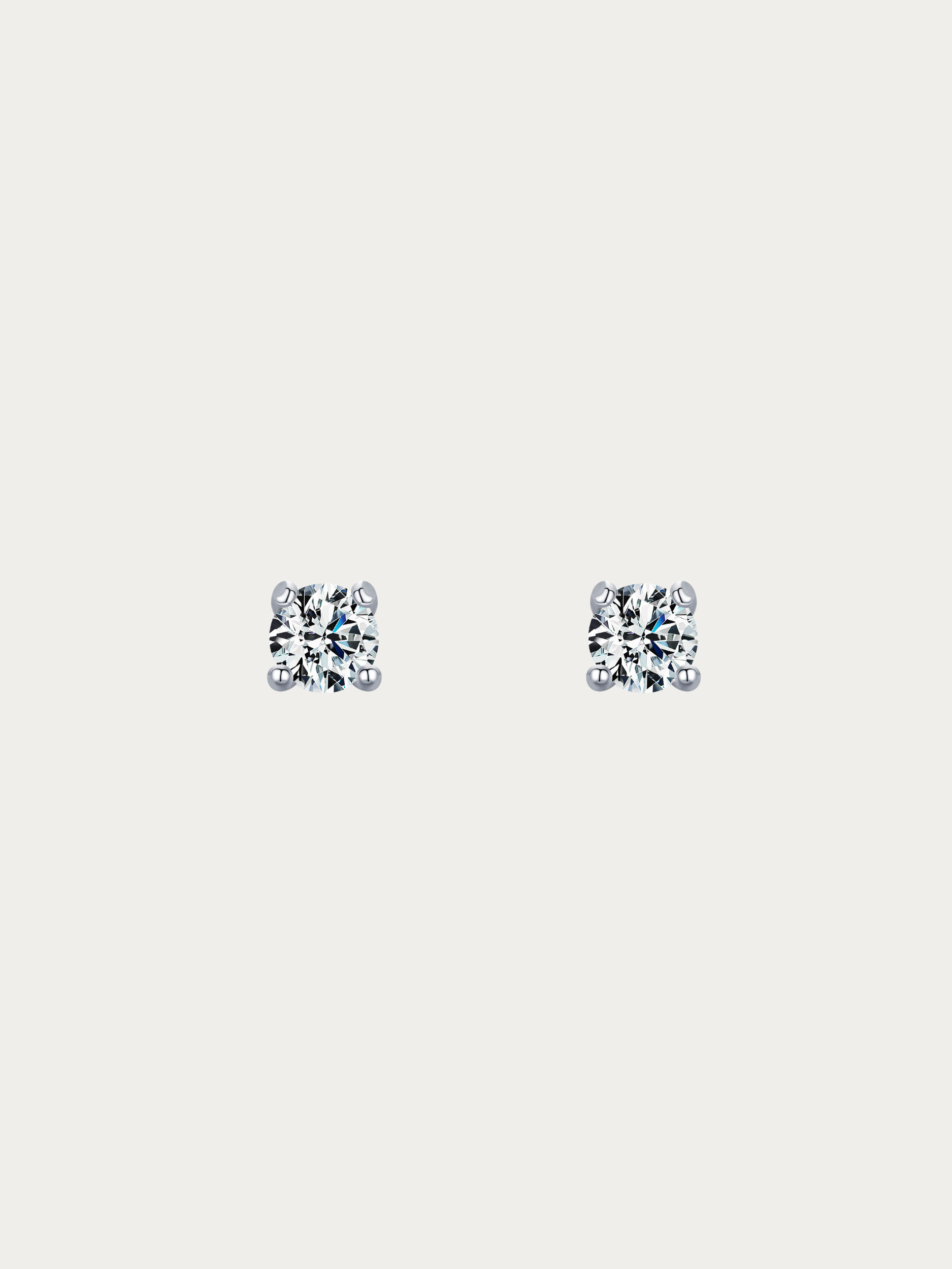 Caulie Classic Everyday 0.1ct Moissanite Stud Earrings pair on light background
