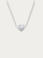Celeste Dream Heart Engravable Necklace silver tone titanium, puffy heart pendant on snake chain, product flatlay