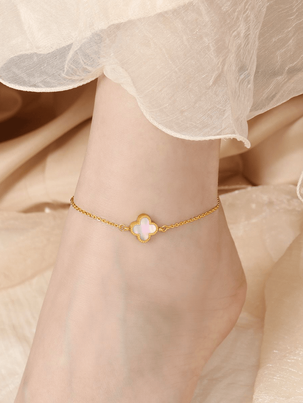 Clover Duo Anklet white shell variant worn on ankle, gold titanium clover anklet Malaysia lifestyle
