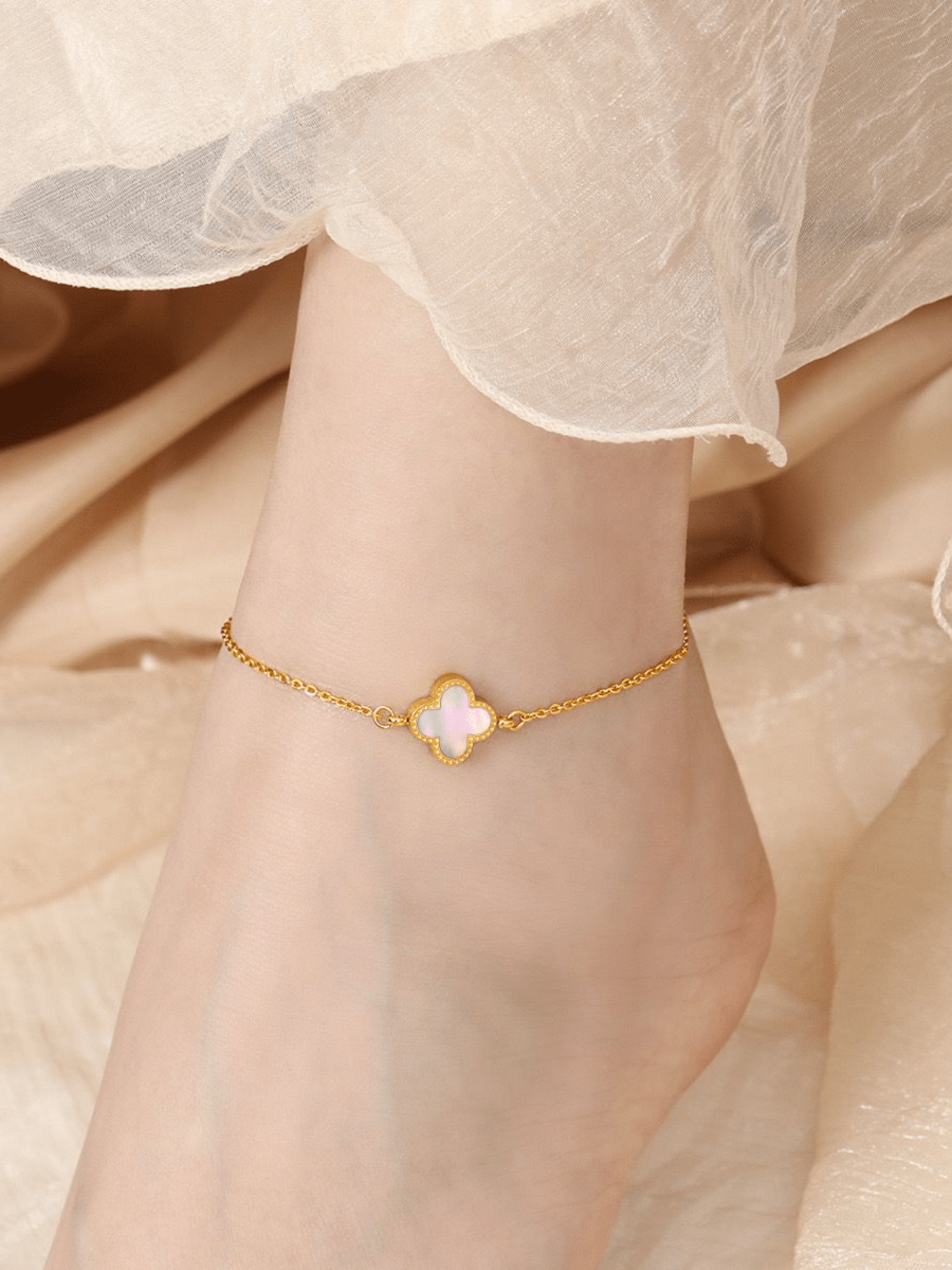Clover Duo Anklet white shell variant worn on ankle, gold titanium clover anklet Malaysia lifestyle