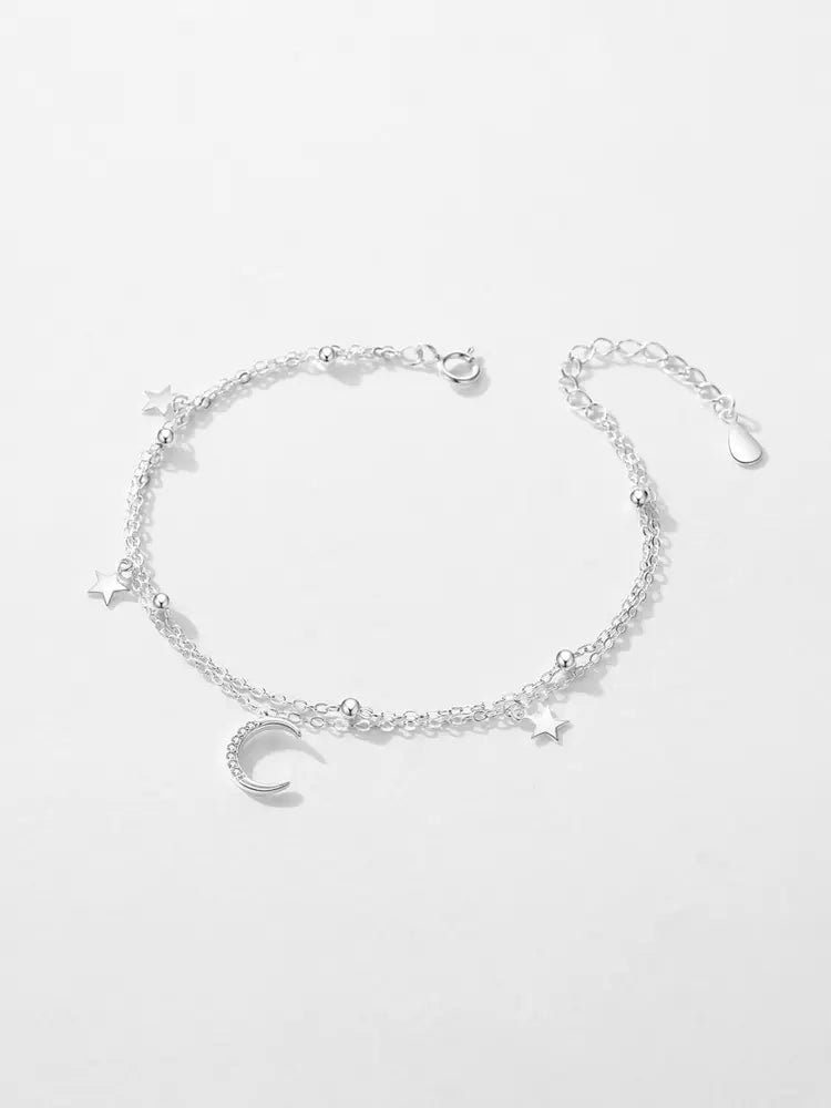 Close-up of CRESSIDA Moon and Stars Bracelet moon charm