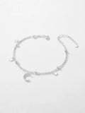 Close-up of CRESSIDA Moon and Stars Bracelet moon charm