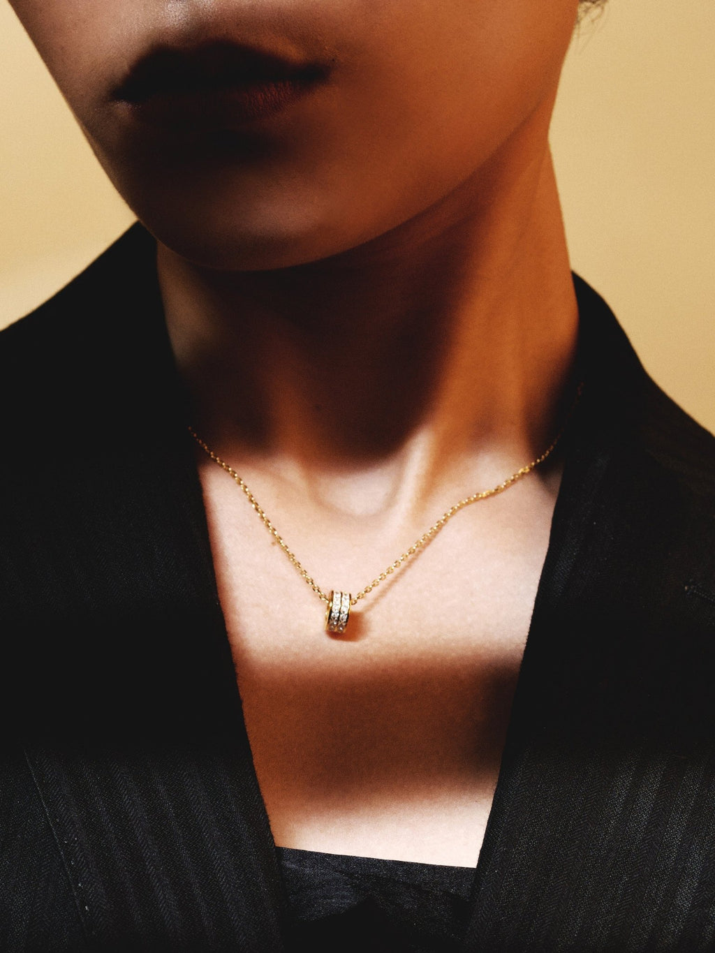 Model wearing DANIELLE Rolling Stones Necklace at the collarbone