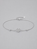 Macro detail of pavé heart charm on Daydreamer CZ Heart Charm Bracelet